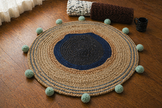 Coastal Weave Jute Round Rug with Pom-Pom Accents