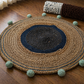 Coastal Weave Jute Round Rug with Pom-Pom Accents