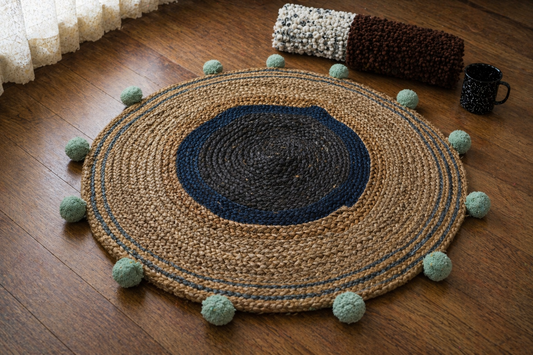 Coastal Weave Jute Round Rug with Pom-Pom Accents